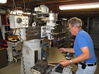  Bill drill holes for the knockout plug cutters. These holes will provide side clearance for the axles.